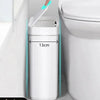 A white slim bathroom trash can with a press-fit lid is shown next to a toilet.