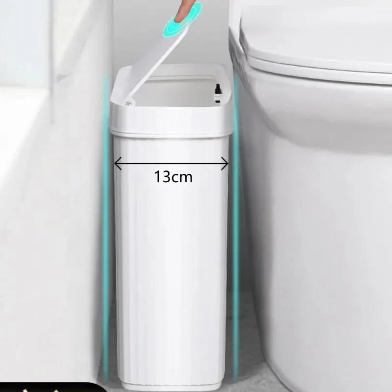 A white slim bathroom trash can with a press-fit lid is shown next to a toilet.