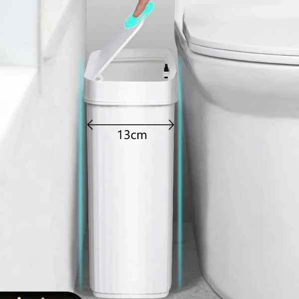 A white slim bathroom trash can with a press-fit lid is shown next to a toilet.