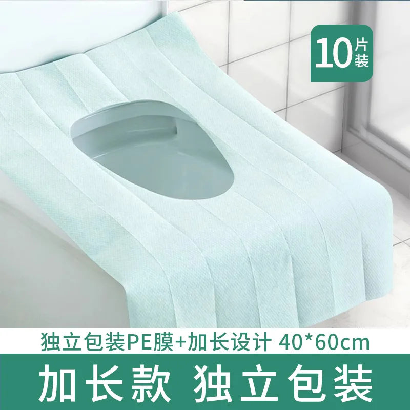 Light blue disposable printing seat covers with a molded seat design shown in a close-up view.