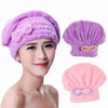 A woman is modeling a purple microfiber hair drying towel cap, with separate purple and pink versions shown.