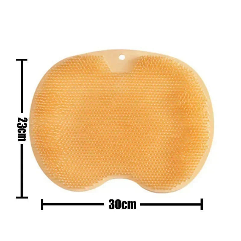 A beige reusable silicone foot scrub brush with a textured surface shown against a white background.