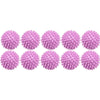 A row of pink reusable laundry balls for clothes and machines.