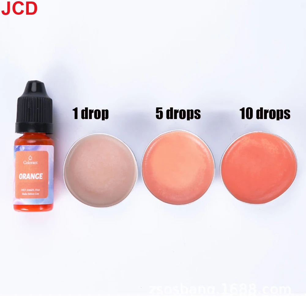 A set of liquid candle dye in orange color shown with 1, 5, and 10 drops on a white background.
