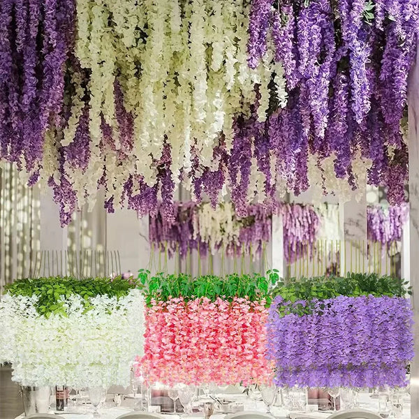 A display of artificial wisteria garlands in purple and white hanging decor