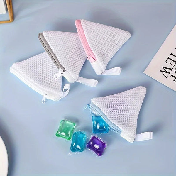 White reusable zipper storage bags filled with various colored liquid items