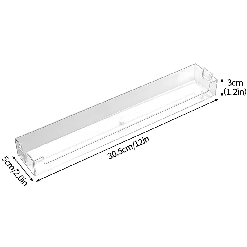A transparent acrylic display shelf measuring 30.5cm long by 5cm deep and 3cm high.