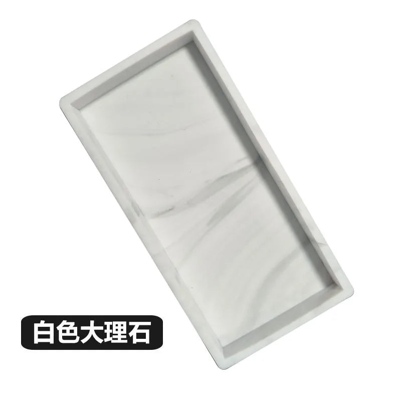 A rectangular white marble tray organizer set for kitchen or bathroom use.