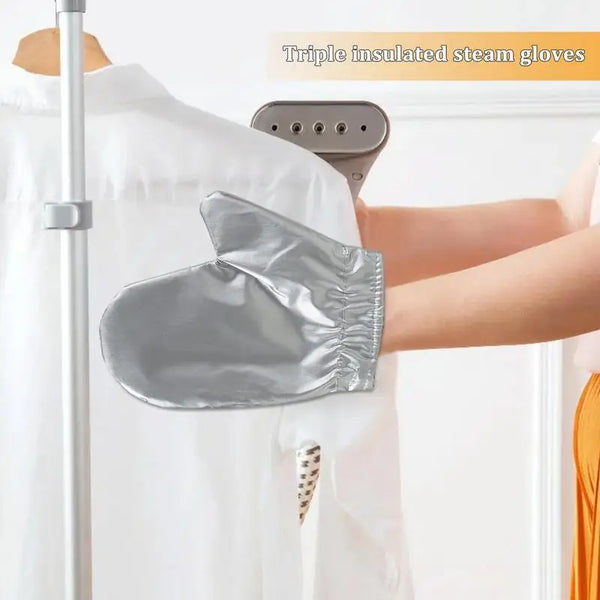 A silver triple insulated steam glove is shown being placed onto a white garment.