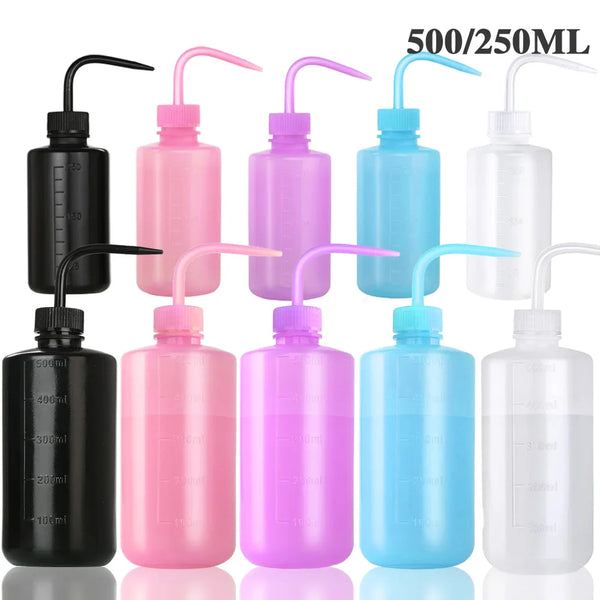 A collection of five squeeze bottles in various colors including black, pink, purple, blue, and clear glass with measurement 