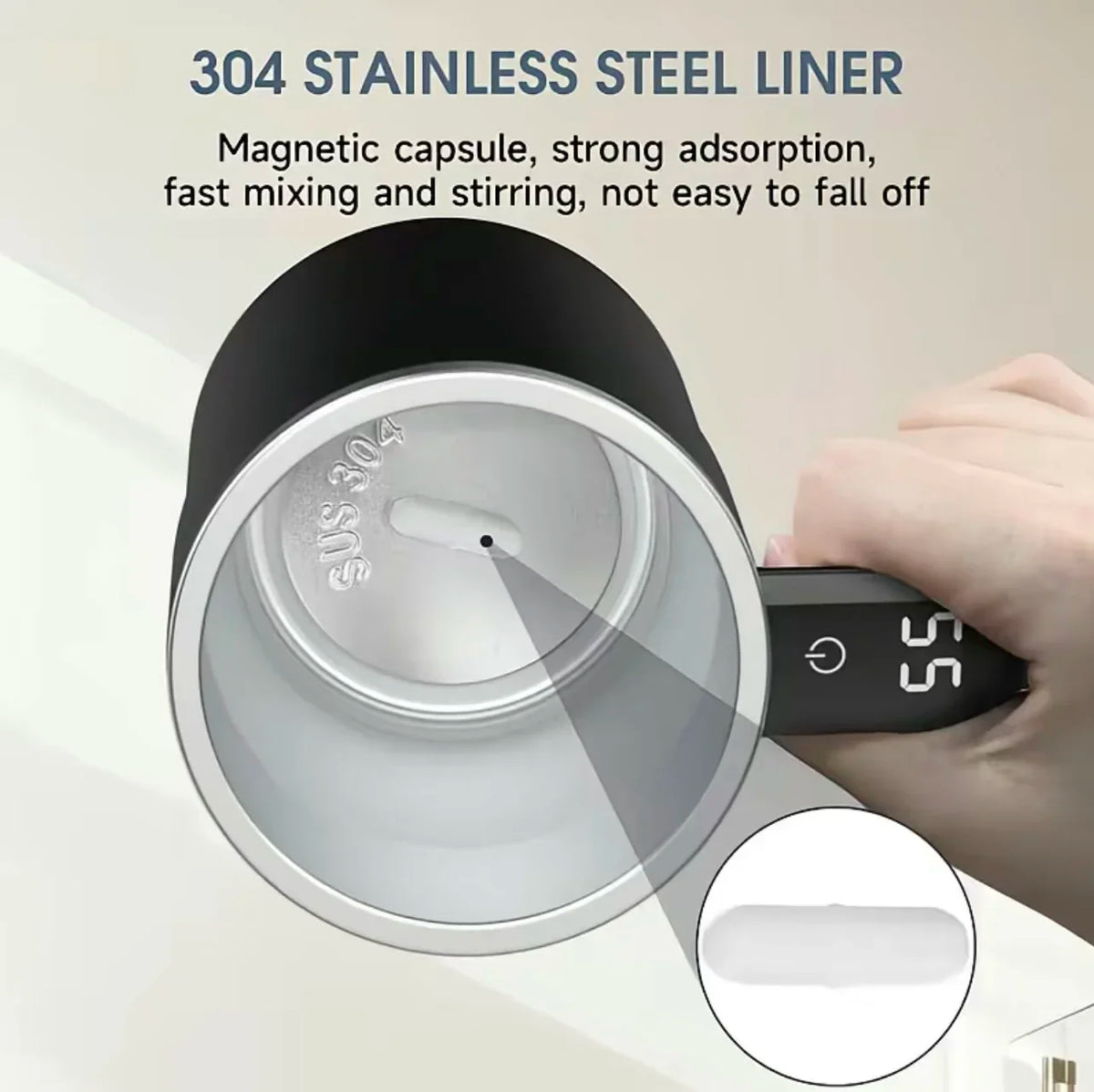A close-up of a stainless steel liner for an electric self-stirring coffee mug, showing the magnetic capsule and stirring mec