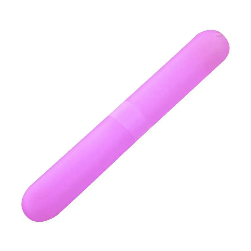 A pink portable toothbrush storage case shown in a diagonal view.