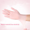 A hand wearing a pink nitrile cleaning glove demonstrates the elasticity of the material.