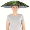 A woman wearing a camouflage patterned umbrella hat for sun and rain protection.