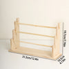 Solid wood ladder jewelry organizer with multiple tiers showing its dimensions and structure.