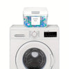 A white laundry pod organizer with colorful pods is placed on top of a white washing machine.
