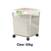Clear 30kg transparent airtight rice dispenser with a light green lid and wheels.