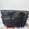 Black quilted multi-pocket tote bag for laptop and daily organizer
