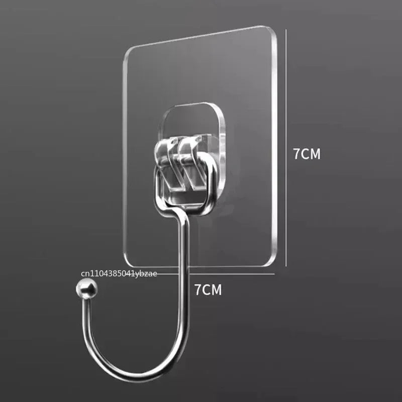 Clear self-adhesive rotating wall hooks with a loop and a ball, shown against a gray background.
