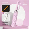 A pink folding umbrella with double-wave fiber ribs and lotus root color is displayed against a light background.