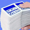 A hand holds a stack of disposable lens and screen cleaning wipes, showing the packaged product.
