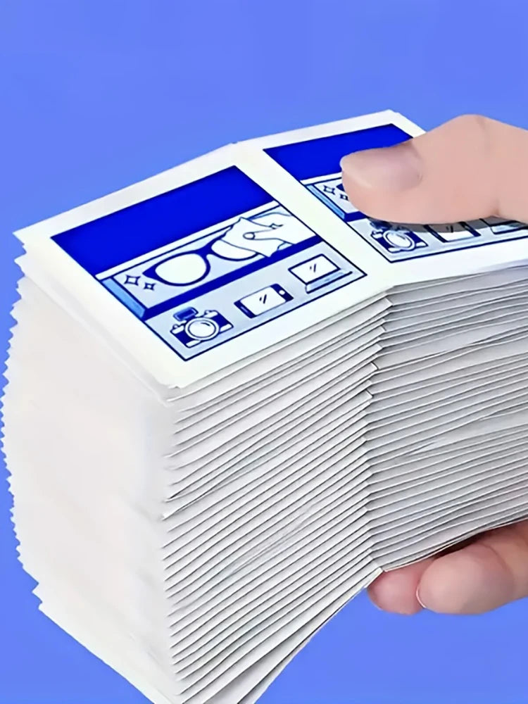 A hand holds a stack of disposable lens and screen cleaning wipes, showing the packaged product.