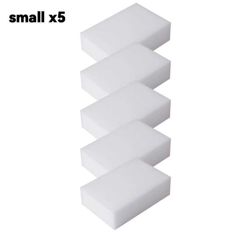 A stack of five white melamine cleaning sponges or magic erasers.