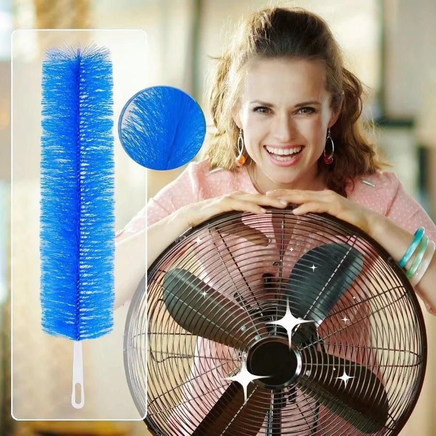 A woman holds a large, dark-colored cleaning brush in front of her face, with a blue cleaning brush visible nearby.