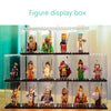 A display box filled with various miniature figures and collectibles in clear dustproof cases.