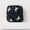 Black pouch with a floral pattern featuring silhouette drawings of horses and text reading Travel Season