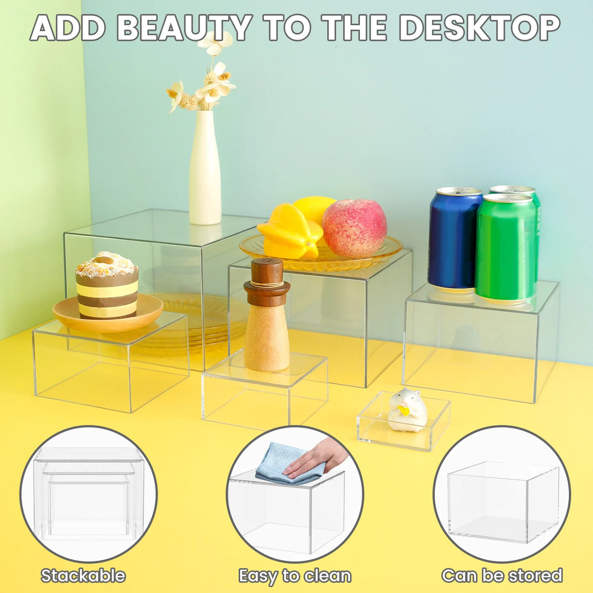 Acrylic stackable buffet riser used to display food items like pastries and fruit on a desk.