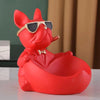 A bright red French bulldog sculpture designed as a coin bank and snack holder.