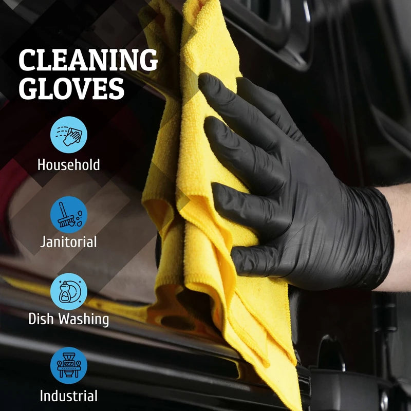 A hand wearing a black cleaning glove is holding a yellow cloth towel in a dark background.