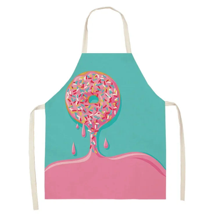 A bright teal apron featuring a pink dripping donut design.