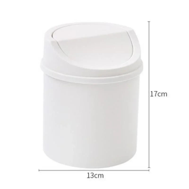 White compact desktop trash can with a flip-top lid and dimensions shown.