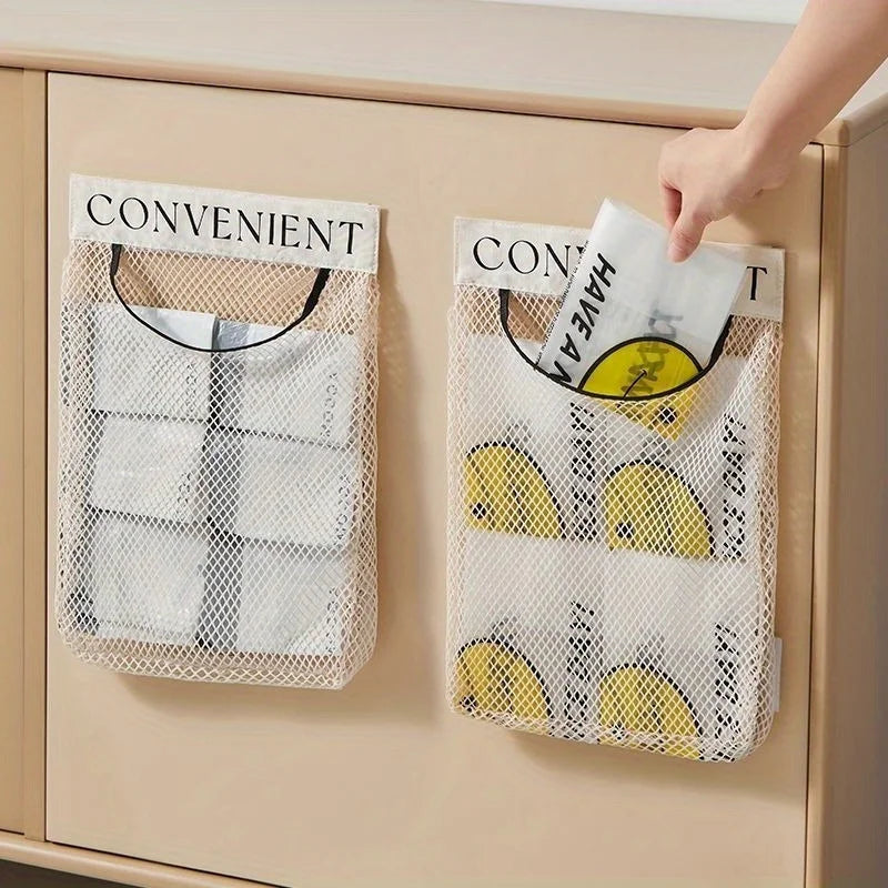 A hand is placing a paper labeled CONVENIENT into an elastic mesh bag holder for kitchen organization.