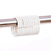 White silicone shower curtain rings coiled on a metal rod.