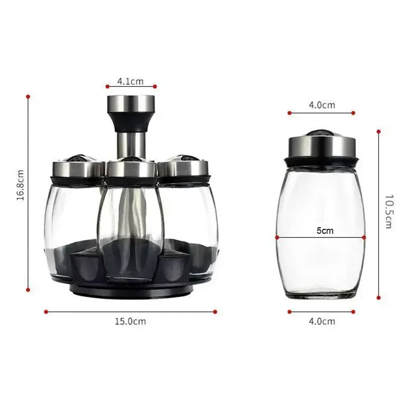 A rotating glass spice jar rack with stainless steel lids shown from the side.