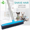 A blue telescopic rubber broom is shown with several dogs resting nearby, demonstrating hair pet rest assured.