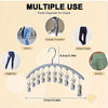 Percha de acero inoxidable con organizador de múltiples clips para colgar diversos tipos de pantalones y ropa.