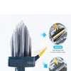 A black floor scrub brush with yellow handles and bristles shown for cleaning tile and hardwood surfaces.