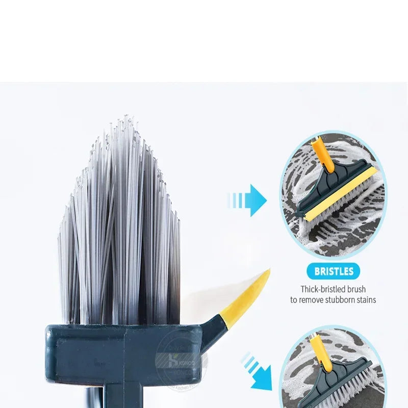 A black floor scrub brush with yellow handles and bristles shown for cleaning tile and hardwood surfaces.