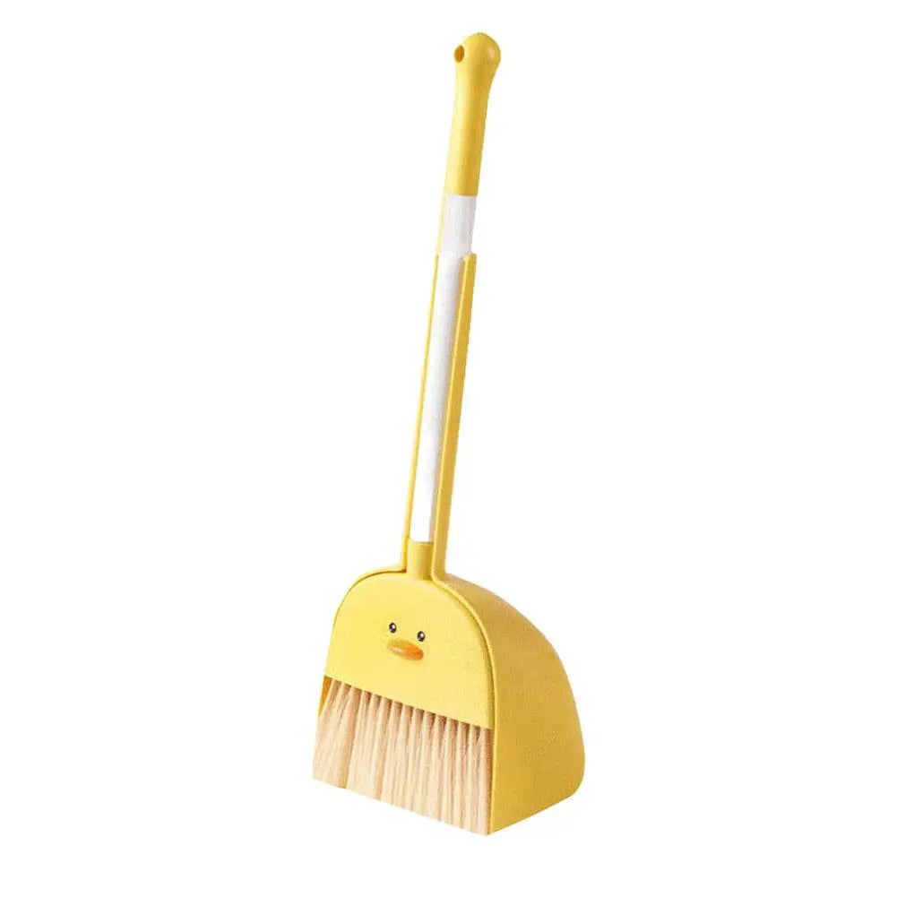 A yellow toddler mini broom and dustpan set with a white handle.