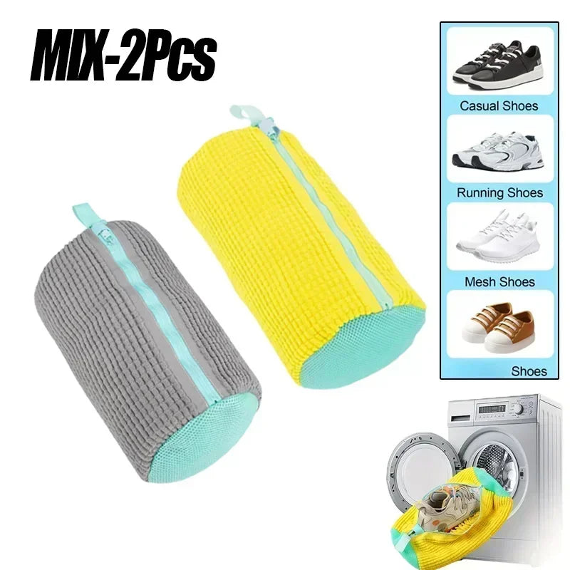 Two laundry bags for shoes, one gray and one yellow, shown next to a washing machine.