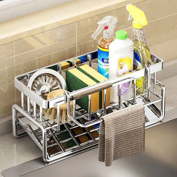 Stainless steel kitchen sink caddy with drainage tray holding cleaning bottles and brushes
