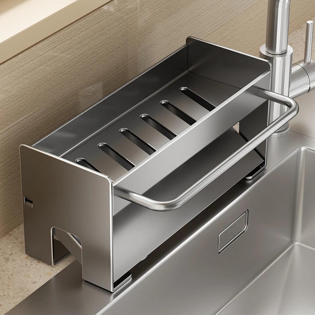 Stainless steel kitchen sink caddy with a draining tray for sponges and dish tools