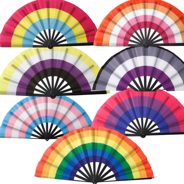 A collection of nine gradient rainbow handheld cooling fans in various colors and angles.