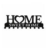 Black rustic metal wall hook key holder with the words HOME SWEET HOME carved into the design.