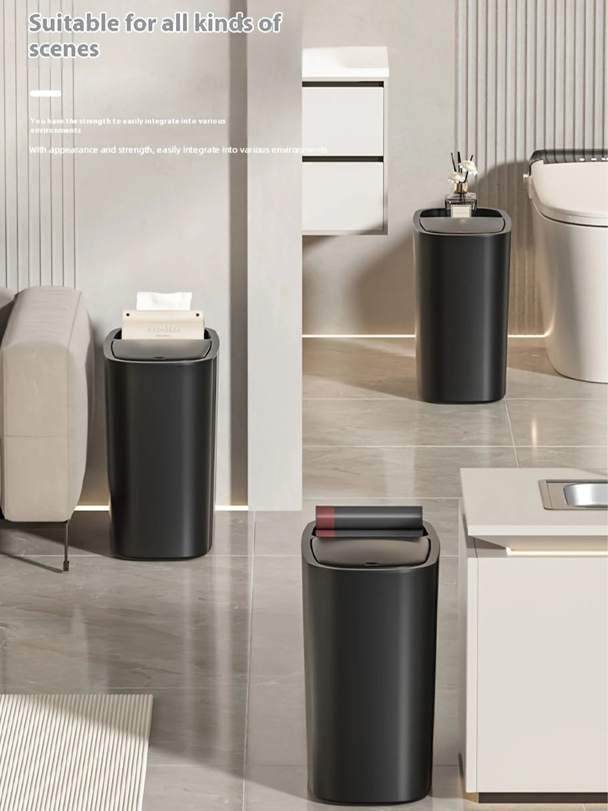 A black odor-sealing trash can with a press lid is shown in a modern bathroom setting.