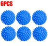 Six blue silicone laundry balls arranged in a row.